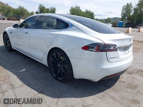 2018 Tesla Model S 75D with VIN 5YJSA1E22JF246928, listed as a IAAI auction lot 41869364 with 100,067 mi miles and . Bid and sale history available at DreamBid. Image 3.