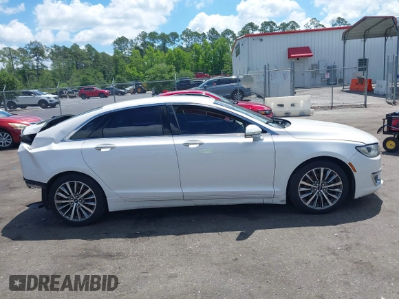 2017 Lincoln MKZ Hybrid Select z VIN 3LN6L5LUXHR600982, wystawiony jako IAAI lot #42266287 z przebiegiem 201 450 mil mil oraz . Historia ofert i sprzedaży dostępna na DreamBid. Obrazek 13.