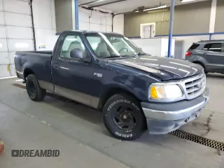 2003 Ford F-150 XL with VIN 1FTRF17293NA60031, listed as a Copart auction lot 55433885 with 186,557 mi miles and Salvage title. Bid and sale history available at DreamBid. Image 4.
