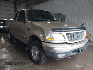 1999 Ford F-150 with VIN 1FTRX18W0XKA68363, listed as a IAAI auction lot 41524104 with 218,400 mi miles and . Bid and sale history available at DreamBid. Image 1.