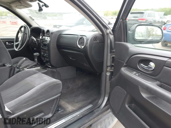 2007 GMC Envoy SLE z VIN 1GKDS13S572214421, wystawiony jako IAAI lot #42186747 z przebiegiem Nie podano mil oraz . Historia ofert i sprzedaży dostępna na DreamBid. Obrazek 5.