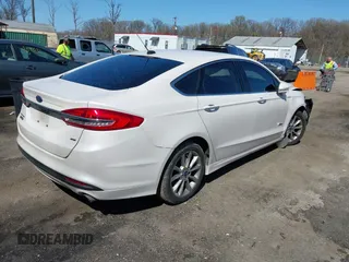 2018 Ford Fusion Energi SE with VIN 3FA6P0PU9JR105934, listed as a IAAI auction lot 41935227 with 149,863 mi miles. Bid and sale history available at carsss.com. Image 4.
