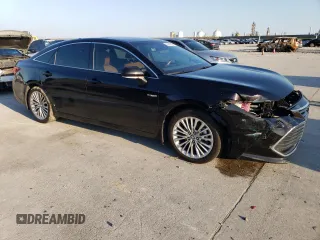 2020 Toyota Avalon Limited Hybrid z VIN 4T1C21FB2LU012066, wystawiony jako Copart lot #70624702 z przebiegiem 59 611 mil mil oraz . Historia ofert i sprzedaży dostępna na DreamBid. Obrazek 4.