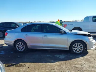 2015 Volkswagen Jetta SE z VIN 3VWD07AJ6FM326731, wystawiony jako IAAI lot #41066250 z przebiegiem 63 242 mil mil oraz . Historia ofert i sprzedaży dostępna na DreamBid. Obrazek 13.
