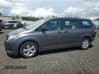 2014 Toyota Sienna L with VIN 5TDZK3DC2ES472289, listed as a Copart auction lot 59750395 with 142,184 mi miles and Salvage title. Bid and sale history available at DreamBid. Image 1.