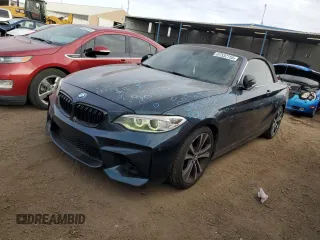 2015 BMW 2 Series 228i with VIN WBA1K5C53FV242793, listed as a Copart auction lot 87532155 with 114,802 mi miles and Non Repairable. Bid and sale history available at carsss.com. Image 1.