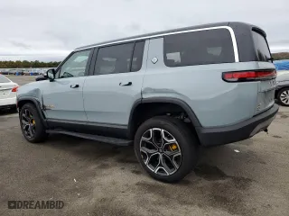 2023 Rivian R1S Adventure with VIN 7PDSGABA4PN011024, listed as a Copart auction lot 72703154 with 14,043 mi miles and Salvage Title. Bid and sale history available at carsss.com. Image 2.