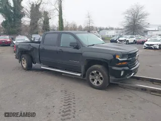 2016 Chevrolet Silverado 1500 LT with VIN 3GCUKREC6GG141423, listed as a IAAI auction lot 41731888 with 106,377 mi miles. Bid and sale history available at carsss.com. Image 1.