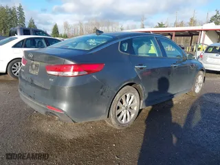 2016 Kia Optima EX with VIN 5XXGU4L33GG010286, listed as a IAAI auction lot 41669758 with 111,713 mi miles. Bid and sale history available at carsss.com. Image 4.