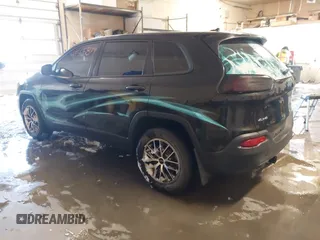 2015 Jeep Cherokee Sport with VIN 1C4PJMAB6FW773953, listed as a IAAI auction lot 41565879 with 242,580 mi miles. Bid and sale history available at carsss.com. Image 3.