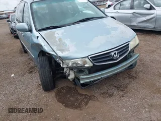 2004 Honda Odyssey EX-L with VIN 5FNRL18064B060817, listed as a IAAI auction lot 42032796 with 200,999 mi miles and . Bid and sale history available at DreamBid. Image 6.