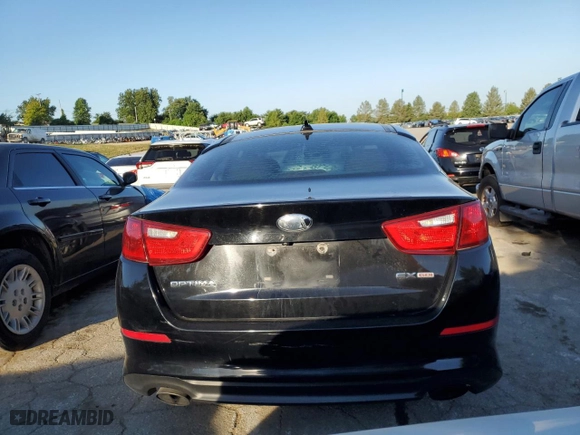 2015 Kia Optima EX with VIN 5XXGN4A79FG354934, listed as a Copart auction lot 61122404 with 153,676 mi miles and Salvage Title. Bid and sale history available at carsss.com. Image 6.