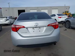 2018 Toyota Corolla L z VIN 5YFBURHE2JP831394, wystawiony jako IAAI lot #41689172 z przebiegiem 74 985 mil mil oraz . Historia ofert i sprzedaży dostępna na DreamBid. Obrazek 16.