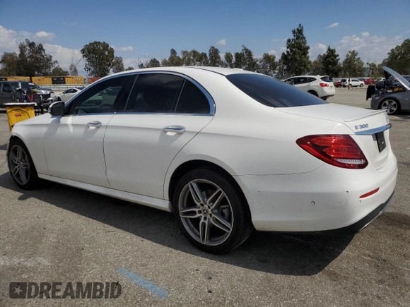 2019 Mercedes-Benz E 300 with VIN WDDZF4JB4KA568736, listed as a Copart auction lot 51931225 with 76,692 mi miles and Salvage title. Bid and sale history available at DreamBid. Image 2.
