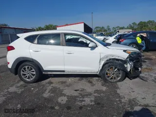 2018 Hyundai Tucson SE with VIN KM8J23A42JU627533, listed as a IAAI auction lot 41880112 with 61,840 mi miles. Bid and sale history available at carsss.com. Image 14.