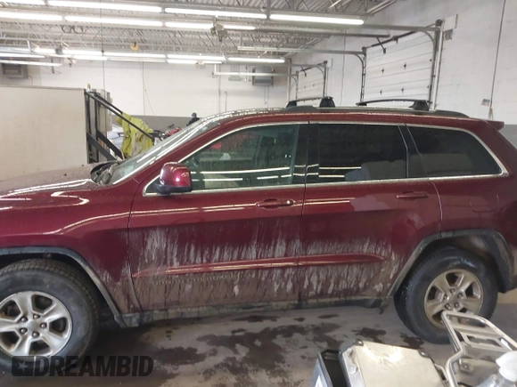 2016 Jeep Grand Cherokee Laredo z VIN 1C4RJFAG3GC471619, wystawiony jako IAAI lot #41659523 z przebiegiem 139 671 mil mil oraz . Historia ofert i sprzedaży dostępna na DreamBid. Obrazek 14.