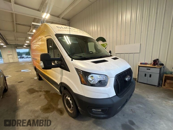 2023 Ford Transit Cargo with VIN 1FTBR1X81PKA75434, listed as a IAAI auction lot 42742887 with 5,111 mi miles and . Bid and sale history available at DreamBid. Image 21.