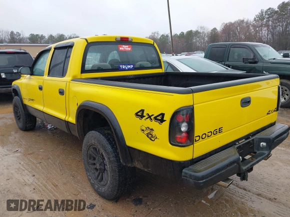 2004 Dodge Dakota Sport z VIN 1D7HG38N64S752270, wystawiony jako IAAI lot #41555599 z przebiegiem 121 283 mil mil oraz . Historia ofert i sprzedaży dostępna na DreamBid. Obrazek 3.