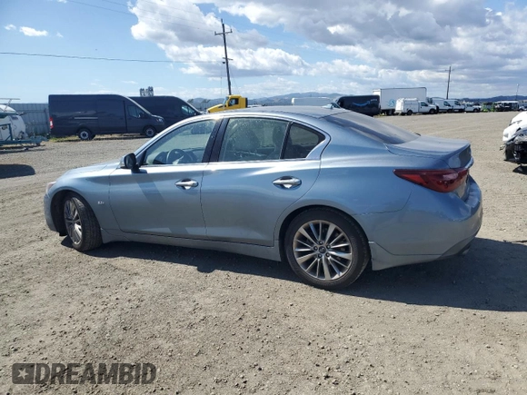 2019 Infiniti Q50 Luxe z VIN JN1EV7APXKM517090, wystawiony jako Copart lot #56740215 z przebiegiem 69 702 mil mil oraz Szkoda całkowita • Salvage title. Historia ofert i sprzedaży dostępna na DreamBid. Obrazek 2.