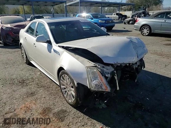 2012 Cadillac CTS Premium z VIN 1G6DP5E3XC0151349, wystawiony jako Copart lot #87004164 z przebiegiem 72 433 mil mil oraz Szkoda całkowita • Salvage title. Historia ofert i sprzedaży dostępna na DreamBid. Obrazek 13.