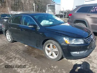 2015 Volkswagen Passat 1.8T Limited Edition with VIN 1VWAT7A30FC116087, listed as a IAAI auction lot 41631808 with 112,370 mi miles. Bid and sale history available at carsss.com. Image 1.