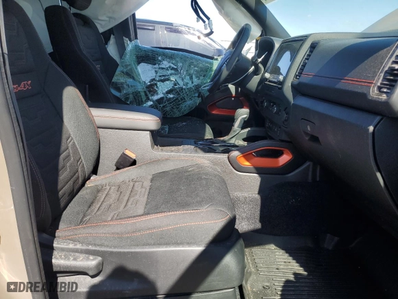 2024 Nissan Frontier PRO-4X with VIN 1N6ED1EK7RN610467, listed as a Copart auction lot 50138015 with 24,723 mi miles and Salvage Title. Bid and sale history available at carsss.com. Image 7.