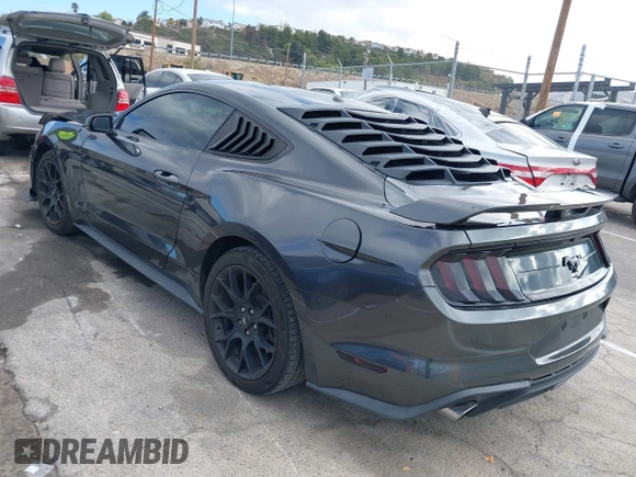 2018 Ford Mustang EcoBoost z VIN 1FA6P8THXJ5154523, wystawiony jako IAAI lot #41523923 z przebiegiem 94 330 mil mil oraz . Historia ofert i sprzedaży dostępna na DreamBid. Obrazek 3.