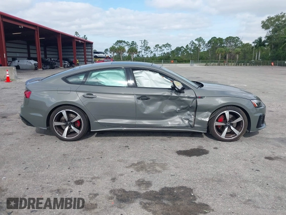 2023 Audi A5 Sportback S line Premium Plus z VIN WAUFACF56PA038023, wystawiony jako IAAI lot #42074137 z przebiegiem 15 998 mil mil oraz . Historia ofert i sprzedaży dostępna na DreamBid. Obrazek 13.