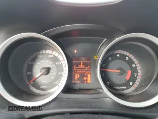 2009 Mitsubishi Lancer DE z VIN JA3AU16U99U001595, wystawiony jako Copart lot #72300274 z przebiegiem 118 028 mil mil oraz Szkoda całkowita • Salvage title. Historia ofert i sprzedaży dostępna na DreamBid. Obrazek 9.