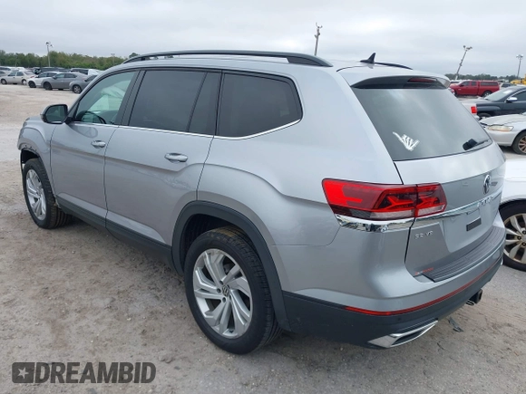 2021 Volkswagen Atlas SE with VIN 1V2JR2CA7MC556268, listed as a IAAI auction lot 41185525 with 73,724 mi miles and . Bid and sale history available at DreamBid. Image 3.