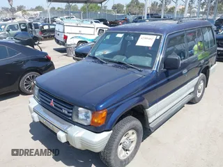1995 Mitsubishi Montero z VIN JA4MR41H4SJ006684, wystawiony jako IAAI lot #42389482 z przebiegiem 399 099 mil mil oraz . Historia ofert i sprzedaży dostępna na DreamBid. Obrazek 6.