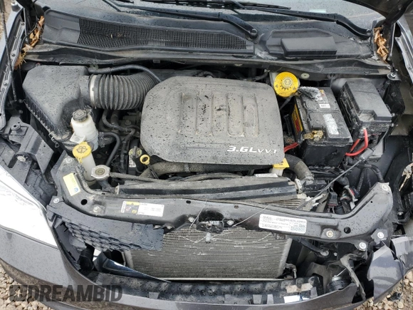2019 Dodge Grand Caravan SXT with VIN 2C4RDGCGXKR518476, listed as a Copart auction lot 52341455 with 59,102 mi miles and Salvage Title. Bid and sale history available at DreamBid. Image 12.