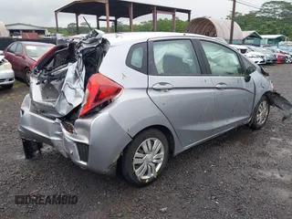 2017 Honda Fit LX with VIN 3HGGK5G53HM700502, listed as a IAAI auction lot 40777067 with 95,827 mi miles and . Bid and sale history available at DreamBid. Image 4.