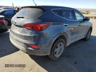 2018 Hyundai Santa Fe 2.4L z VIN 5XYZTDLB5JG568579, wystawiony jako Copart lot #82534794 z przebiegiem 130 032 mil mil oraz Szkoda całkowita • Salvage title. Historia ofert i sprzedaży dostępna na DreamBid. Obrazek 3.