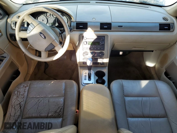 2006 Ford Five Hundred SE with VIN 1FAFP23146G150866, listed as a Copart auction lot 77141084 with 233,540 mi miles and Salvage Title. Bid and sale history available at carsss.com. Image 8.