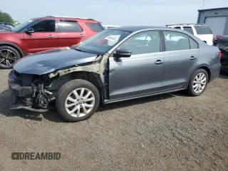 2014 Volkswagen Jetta SE z VIN 3VWD17AJ8EM405443, wystawiony jako Copart lot #59843445 z przebiegiem 156 331 mil mil oraz Szkoda całkowita • Salvage title. Historia ofert i sprzedaży dostępna na DreamBid. Obrazek 1.