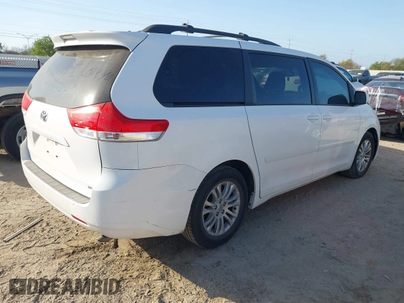 2011 Toyota Sienna XLE AAS with VIN 5TDYK3DC3BS146461, listed as a IAAI auction lot 41829779 with 183,027 mi miles. Bid and sale history available at carsss.com. Image 4.