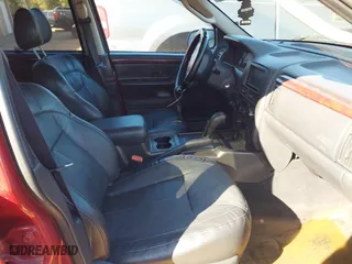 2004 Jeep Grand Cherokee Limited with VIN 1J4GW58N34C124515, listed as a IAAI auction lot 40602071 with 169,358 mi miles. Bid and sale history available at carsss.com. Image 5.