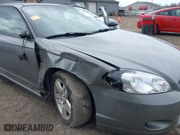 2007 Chevrolet Monte Carlo LT with VIN 2G1WK15K779244127, listed as a IAAI auction lot 42026016 with 128,328 mi miles. Bid and sale history available at carsss.com. Image 6.