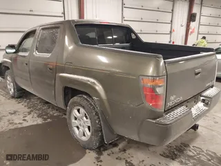 2006 Honda Ridgeline RTL with VIN 2HJYK16546H503553, listed as a IAAI auction lot 41598667 with 197,202 mi miles. Bid and sale history available at carsss.com. Image 3.