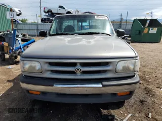 1997 Mazda B-Series Truck z VIN 4F4CR12A1VTM08969, wystawiony jako Copart lot #58539955 z przebiegiem 190 591 mil mil oraz Tytuł czysty. Historia ofert i sprzedaży dostępna na DreamBid. Obrazek 5.