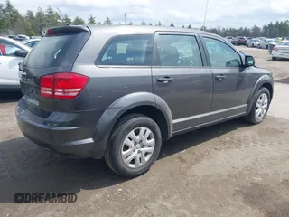 2014 Dodge Journey SE with VIN 3C4PDCABXET219532, listed as a IAAI auction lot 42030341 with 139,145 mi miles and . Bid and sale history available at carsss.com. Image 4.