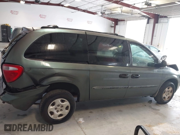 2003 Dodge Caravan SE with VIN 1D4GP24313B191319, listed as a IAAI auction lot 41398477 with 220,083 mi miles. Bid and sale history available at carsss.com. Image 13.
