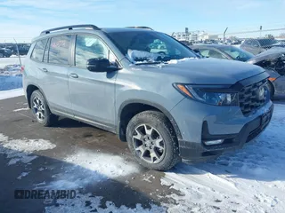 2022 Honda Passport TrailSport with VIN 5FNYF8H66NB031285, listed as a IAAI auction lot 41612372 with 25,997 mi miles and . Bid and sale history available at DreamBid. Image 1.