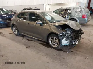 2019 Toyota Corolla Hatchback SE with VIN JTNK4RBE1K3011063, listed as a IAAI auction lot 41656864 with 104,102 mi miles. Bid and sale history available at carsss.com. Image 1.