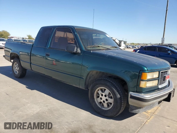 1995 GMC Sierra 1500 with VIN 2GTEC19H9S1560019, listed as a Copart auction lot 79917704 with 259,042 mi miles and Clean Title. Bid and sale history available at DreamBid. Image 4.