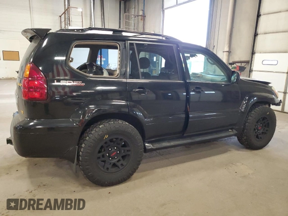 2004 Lexus GX 470 with VIN JTJBT20X740025411, listed as a Copart auction lot 55363145 with 329,164 mi miles and Salvage Title. Bid and sale history available at DreamBid. Image 3.