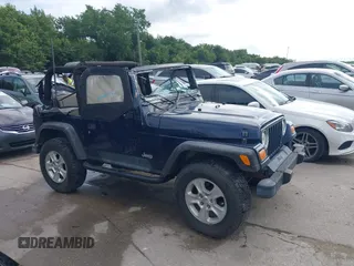 2006 Jeep Wrangler SE with VIN 1J4FA29156P739521, listed as a IAAI auction lot 42563566 with 117,281 mi miles and . Bid and sale history available at DreamBid. Image 13.