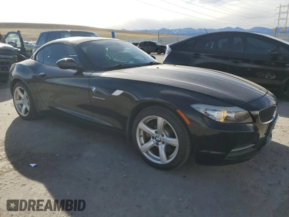 2013 BMW Z4 sDrive28i with VIN WBALL5C50DJ103778, listed as a Copart auction lot 49452215 with 104,203 mi miles and Salvage Title. Bid and sale history available at carsss.com. Image 4.
