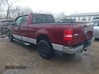 2005 Ford F-150 XLT with VIN 1FTPX12595FA43412, listed as a IAAI auction lot 41902118 with 198,025 mi miles. Bid and sale history available at carsss.com. Image 3.